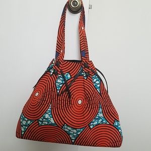 Designer mod print hand bag with leather detail